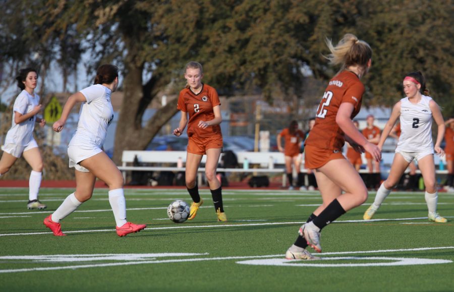 With a traid of Mavericks surrounding her, Tayla Score '25 seeks out Bailey Shuford '25 for a pass. Both Score and Shuford worked to maintain home team possession and continue creating offensive opportunities.