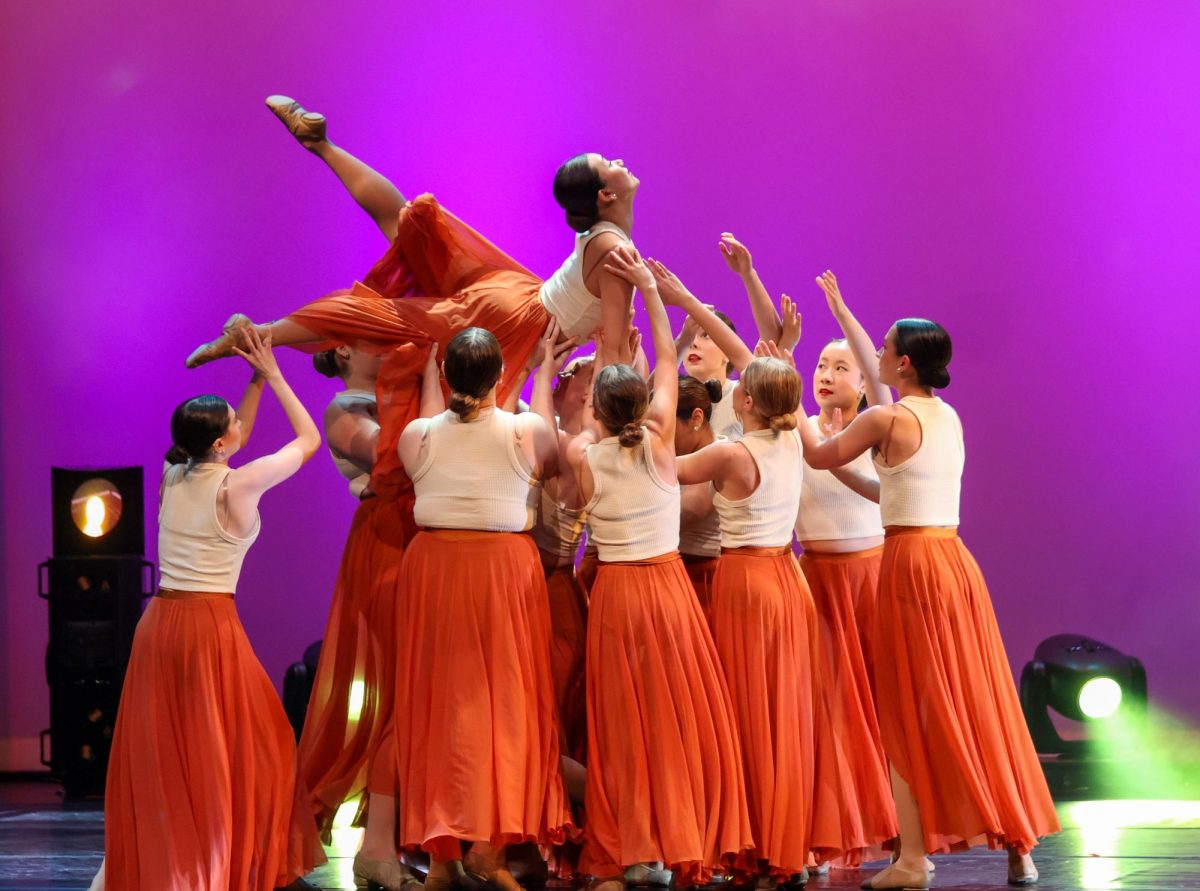 Arising from the group, the SunDancers lift Emma Lin '24 into the air. Lin is a proficient dancer and is the Co-President of the social board. 