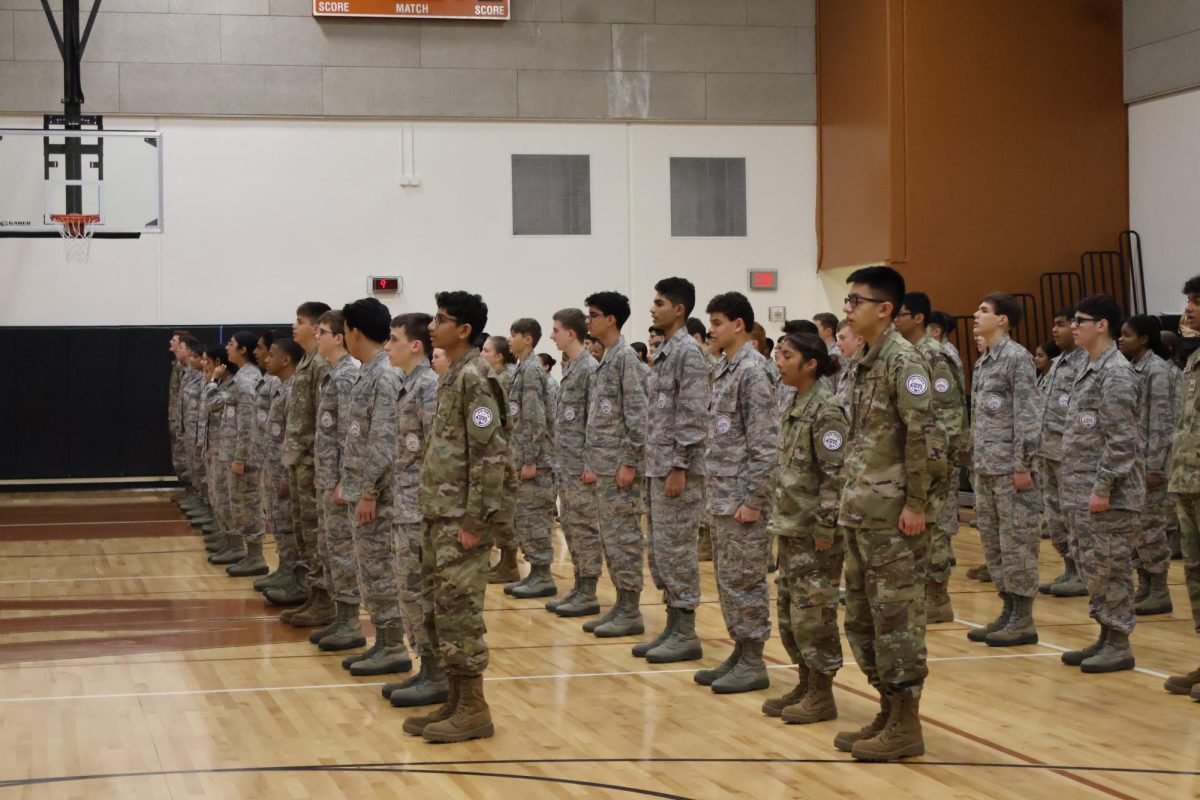 Standing in clean rows, AFJROTC gets in formation for their annual unit inspection from the Air Force Headquarters. The results of this inspection determined the continuation of the program, however, cadets excelled, earning the "exceeds standards" rating, meaning AFJROTC will continue on campus.
