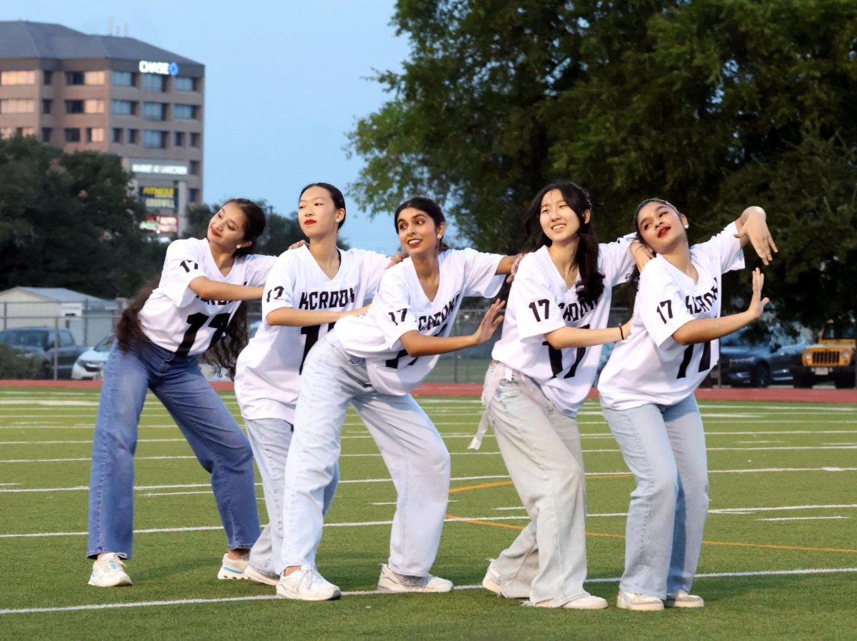 Posing for the audience, K-Pop Club displays their dance skills, bringing high energy and cultural flair to the pep rally. Their performance closed out the event on a high note, leaving the crowd energized and cheering.