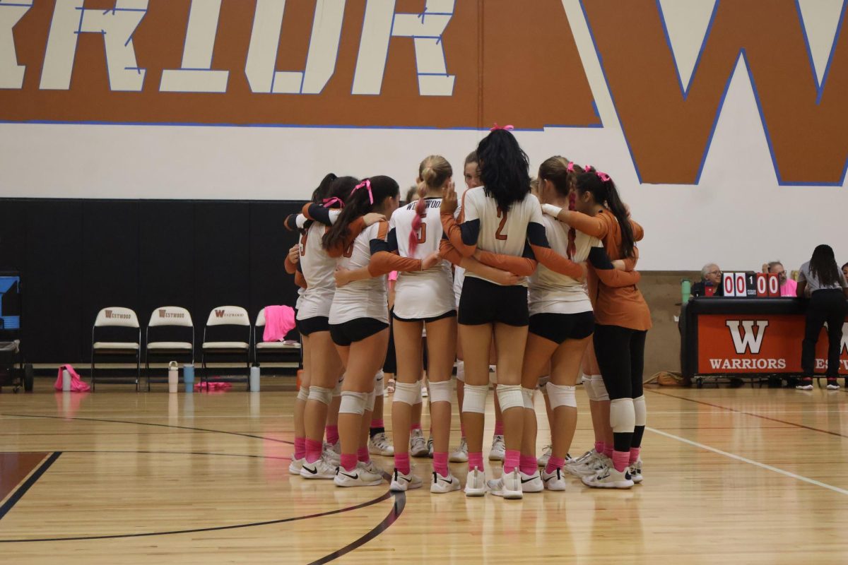 During the one minute timeout in the first half, the Warriors gather to talk and regroup. Even though the Warriors had been up for most of the half, they started to fall behind towards the end.