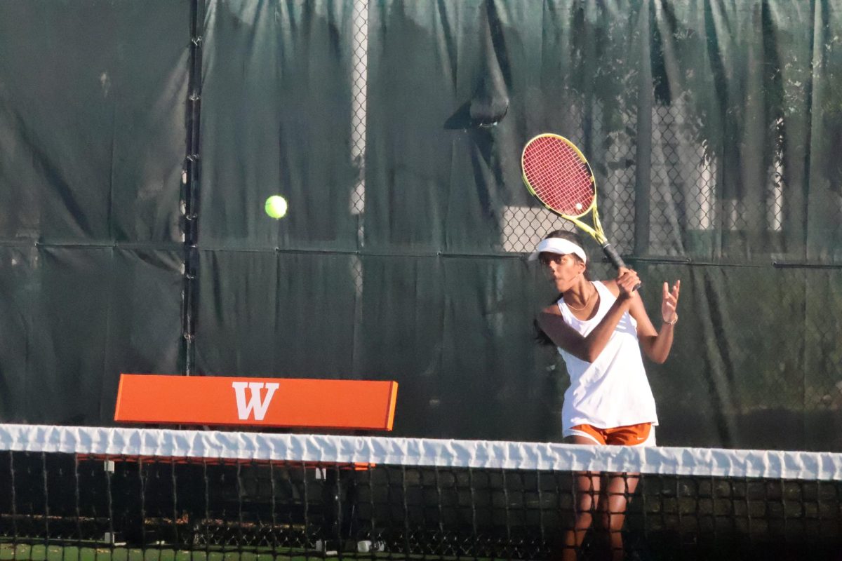 Sanjana Aslesh '26 recovers after a powerful forehand. Aslesh continued the overall trend of the day for the Warriors and ended up winning the match.