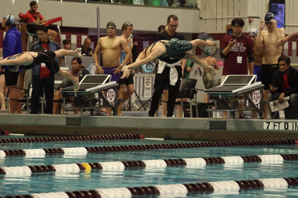 Flying off the blocks, NamAnh Truong '25 launches into her 100-Yard-Freestyle. Over the course of the meet, she received three 1st places, and one 2nd place. 