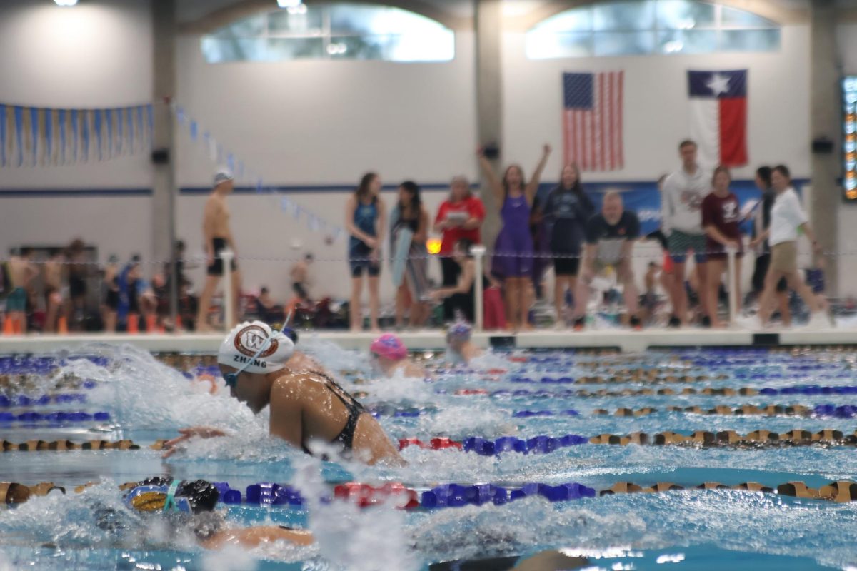 Keeping her head low, Leah Zhang '26 completes the first 50 of the 100-Breastroke. Zhang specializes in mid-distance events such as the 100-Yard-Breastroke and the 200-Yard-Medley.