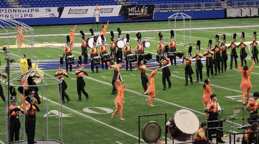 The marching band performs their show Birds on a Wire to judges at the UIL 6A State Marching Contest. This was one of the final stages of the UIL Marching Band Contests, and the Warriors were very hopeful that they would advance to the last round. “I had a lot of fun performing at State because I was proud of how far we’d come as a band and that we made history just by being there,” Addy Temple ‘26 said.
