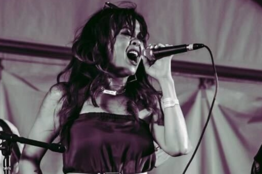 Belting, Austin-based blues musician Lara Price performs at SXSW. A seasoned performer, Price channels her life experiences into her music. "I just love music," Price said. "Even when it's bad, I can still find something good in it."